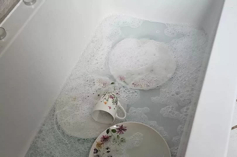 Dirty dishes in the bath