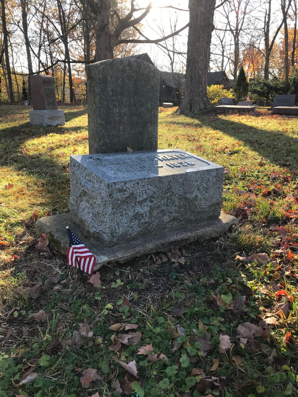 U.S. flags are placed at the graves of  the 13 military veterans in the cemetery  by Sue Faulk. Her father is among them.
