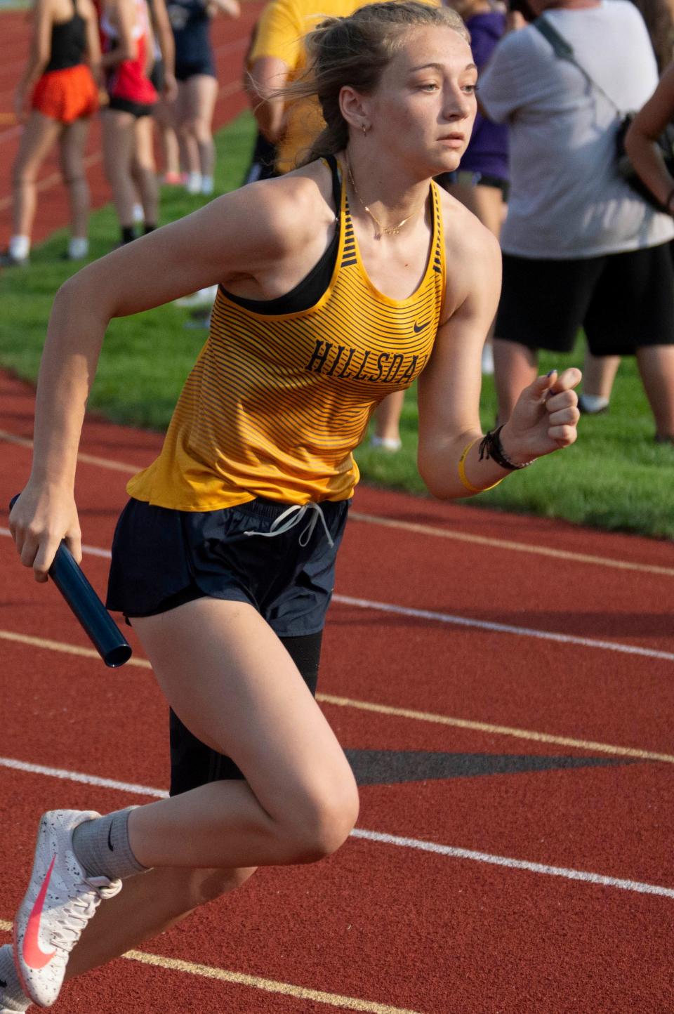 Hillsdale's Kelah Hodge runs in the 4x200-meter relay