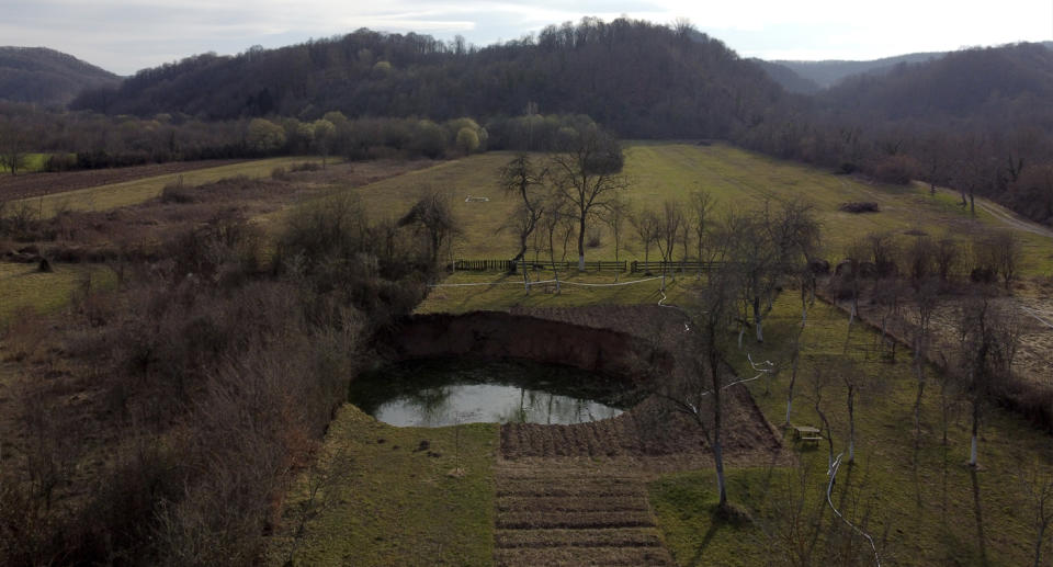This aerial photo shows a sinkhole in the village of Mecencani, central Croatia