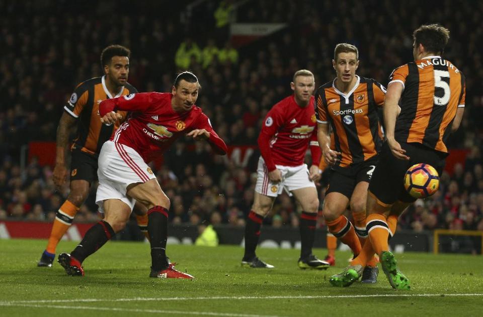 Manchester United's Zlatan Ibrahimovic has a shot on goal during the English Premier League soccer match between Manchester United and Hull City at Old Trafford in Manchester, England, Wednesday, Feb. 1, 2017. (AP Photo/Dave Thompson)