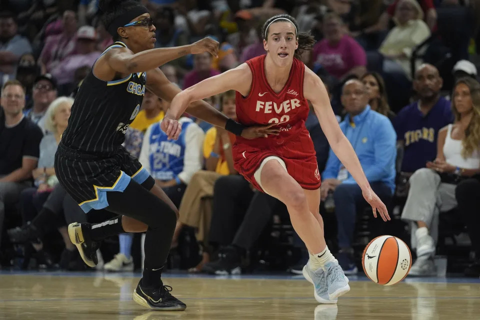 Chicago Sky guard Diamond DeShields, left, guards Indiana Fever guard Caitlin Clark, right, during the second half of a WNBA basketball game Friday, Aug. 30, 2024, in Chicago. (AP Photo/Erin Hooley)