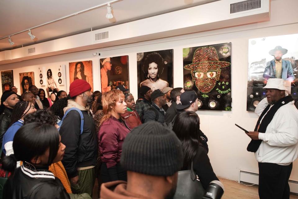 Salaam Remi speaking to her crowd.