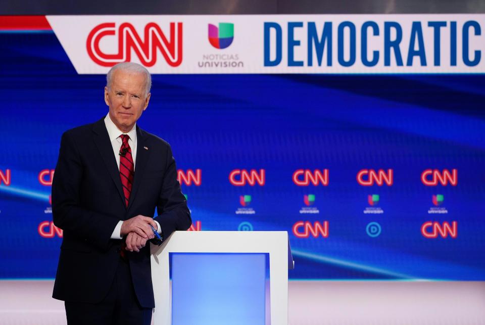 Democratic presidential hopeful former US vice president Joe Biden is seen on stage as he and Senator Bernie Sanders take part in the 11th Democratic Party 2020 presidential debate in a CNN Washington Bureau studio in Washington, DC on March 15, 2020. (Photo by Mandel NGAN / AFP) (Photo by MANDEL NGAN/AFP via Getty Images)