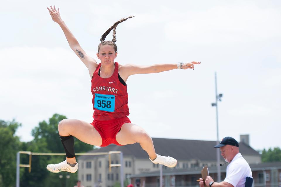 Susquehannock's Ryleigh Marks flies through the air as she competes in the 3A long jump at the PIAA District 3 Track and Field Championships at Shippensburg University Saturday, May 20, 2023. Marks won gold with a top jump of 18-0.