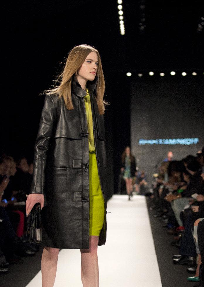 A model walks the runway during the Rebecca Minkoff Fall 2013 fashion show during Fashion Week, Friday, Feb. 8, 2013, in New York. (AP Photo/Karly Domb Sadof)