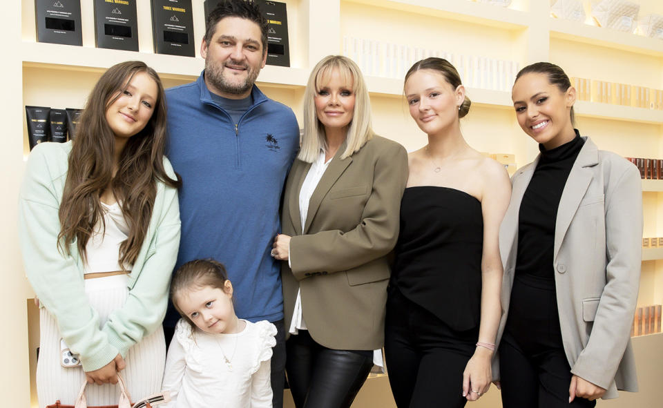 Brendan Fevola, pictured here with wife Alex and daughters Lulu, Tobi, Leni and Mia.