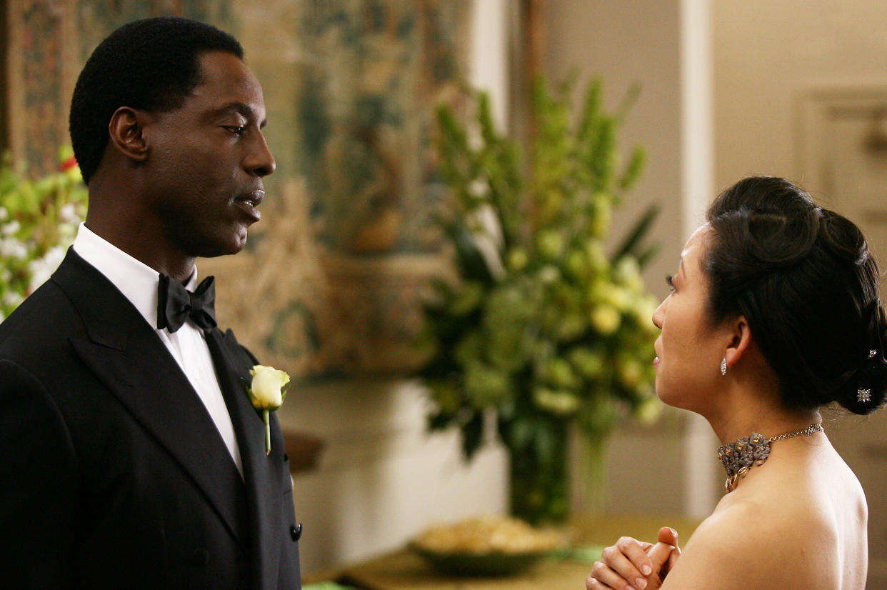 Isaiah Washington as Preston Burke and Sandra Oh as Cristina Yang <span class="copyright">Scott Garfield—Disney General Entertainment Content/Getty Images</span>