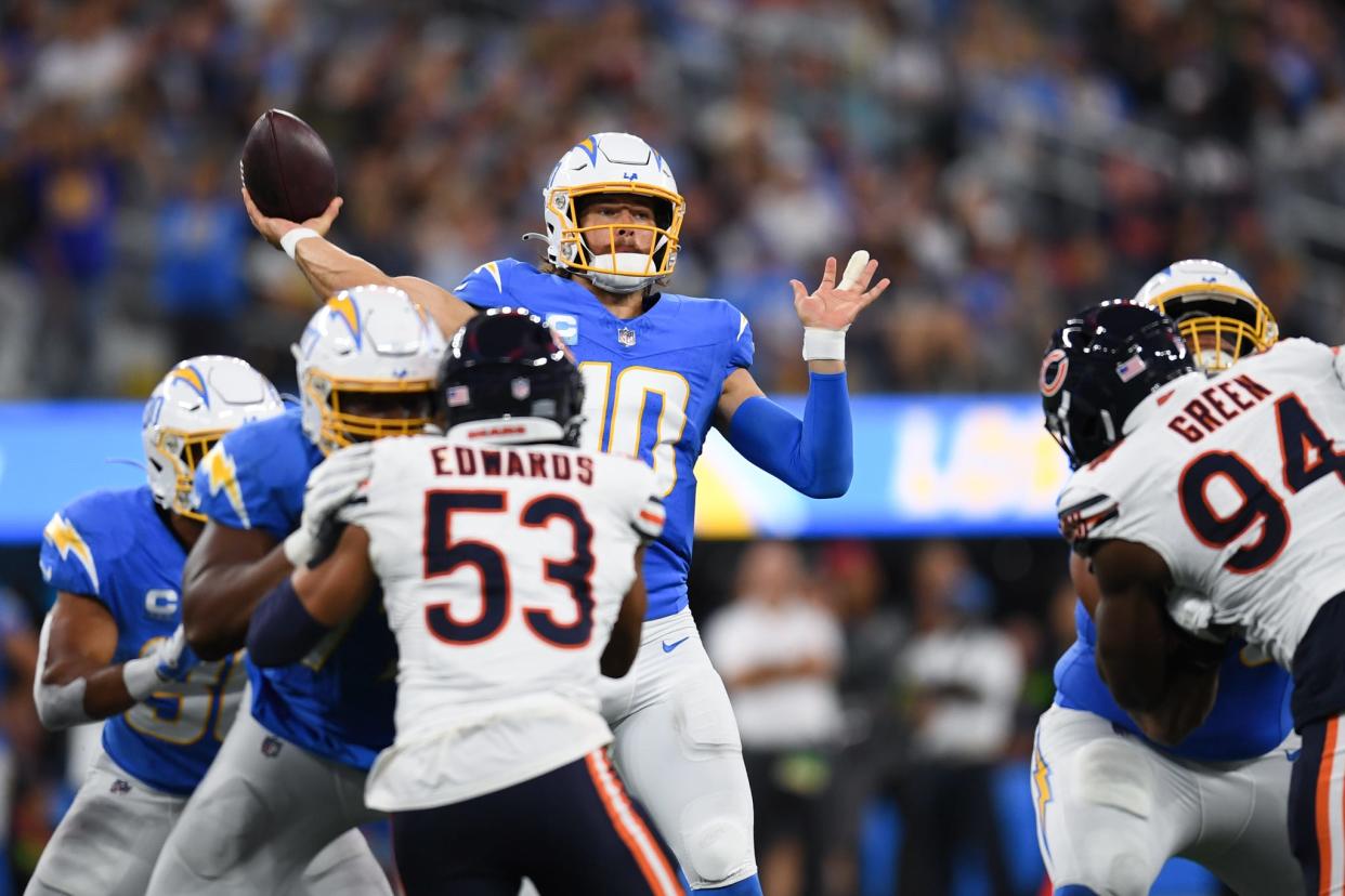 Los Angeles Chargers quarterback Justin Herbert (10) throws a pass against Chicago Bears during second quarter at SoFi Stadium.