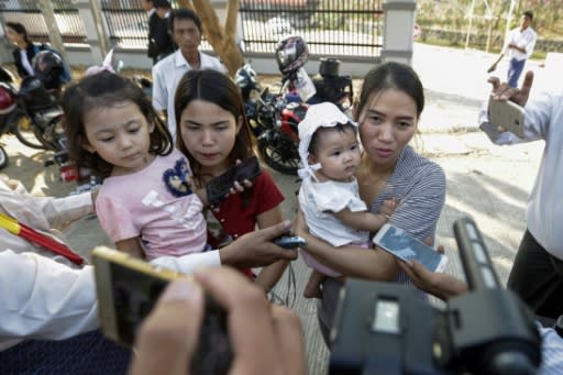 The wives and young daughters of both the journalists travelled to Naypyidaw for the hearing