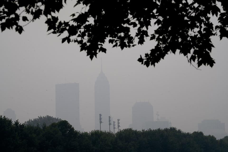 A haze covers Indianapolis, Wednesday, June 28, 2023 as seen from White River Pkwy across White River. Air quality in Central Indiana is being impacted by Canadian wildfires. 
