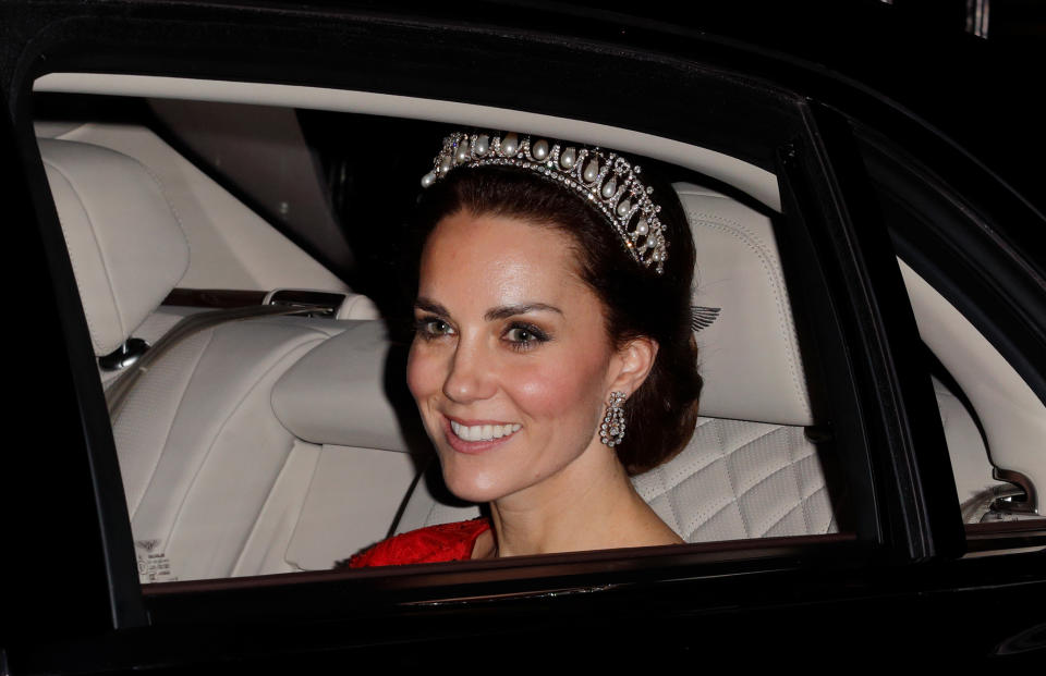 Kate wore the same tiara to the 2016 reception with a red Jenny Packham gown [Photo: Getty]
