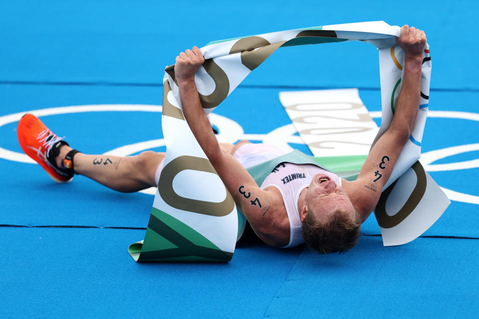 <p>Kristian Blummenfelt of Team Norway celebrates after crossing the line to win the Men's Individual Triathlon on day three of the Tokyo 2020 Olympic Games at Odaiba Marine Park on July 26, 2021 in Tokyo, Japan. (Photo by Cameron Spencer/Getty Images)</p> 