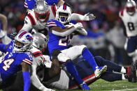 Buffalo Bills running back Devin Singletary (26) carries the ball during the first half of an NFL football game against the New England Patriots in Orchard Park, N.Y., Monday, Dec. 6, 2021. (AP Photo/Adrian Kraus)