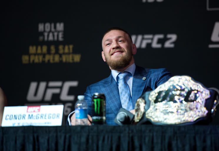 UFC featherweight champion Conor McGregor talks with the media during a news conference. (Getty Images)