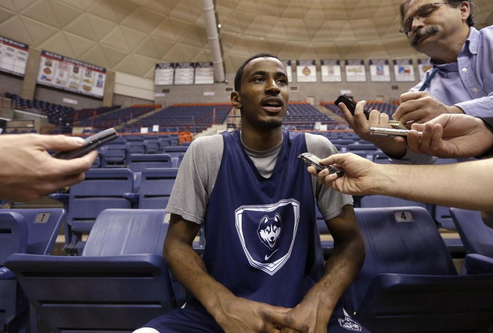 Connecticut's DeAndre Daniels responds to a question following an NCAA college basketball team workout Tuesday, April 1, 2014, in Storrs, Conn. UConn will be playing Florida in the Final Four on Saturday in Dallas. (AP Photo/Steven Senne)