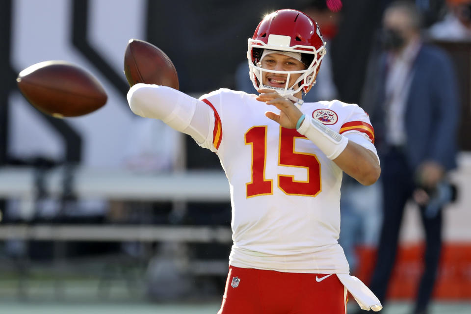 Kansas City Chiefs quarterback Patrick Mahomes (15) throws a pass before an NFL football game against the Tampa Bay Buccaneers Sunday, Nov. 29, 2020, in Tampa, Fla. (AP Photo/Mark LoMoglio)