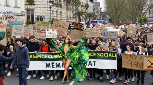 J.Lo in the Versace "jungle" dress and French climate strikers. Collage courtesy of <a href="https://www.instagram.com/p/B2reKV7owcv/" rel="nofollow noopener" target="_blank" data-ylk="slk:Thomas Lélu;elm:context_link;itc:0;sec:content-canvas" class="link ">Thomas Lélu</a>