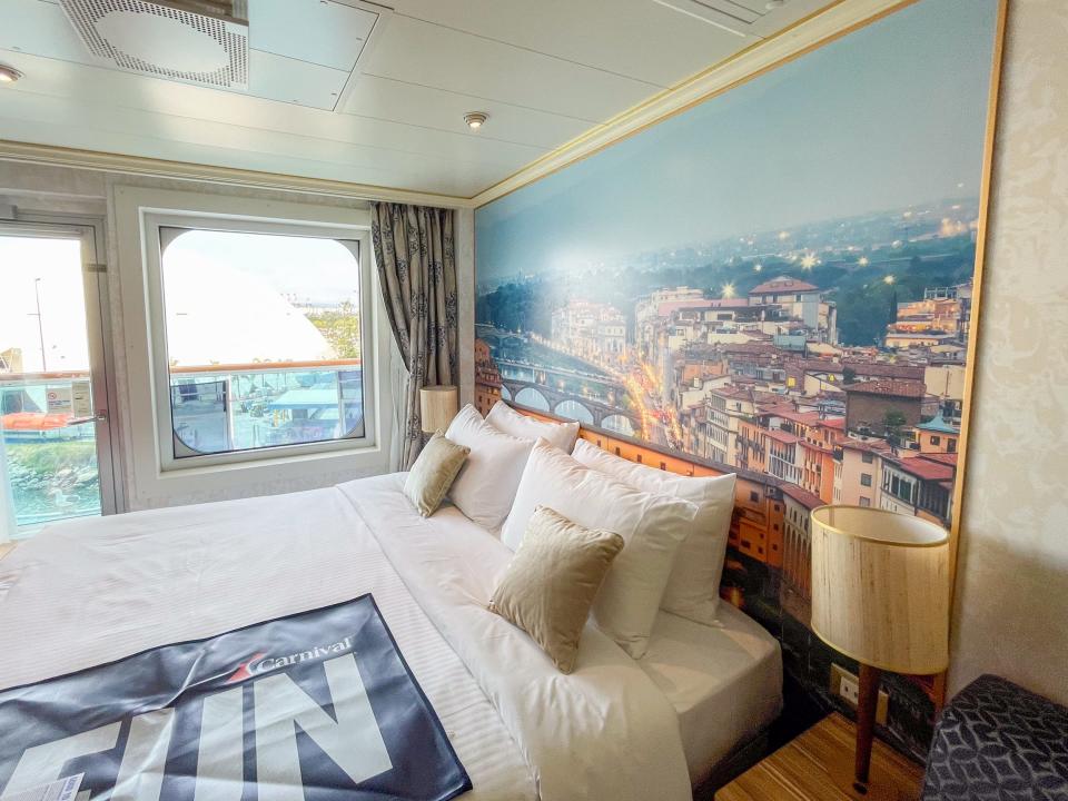 bed of balcony cabin on Carnival Firenze