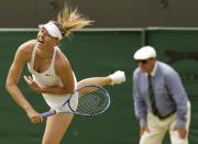 Maria Sharapova of Russia serves during her match against Richel Hogenkamp of the Netherlands at the Wimbledon Tennis Championships in London, July 1, 2015. REUTERS/Henry Browne