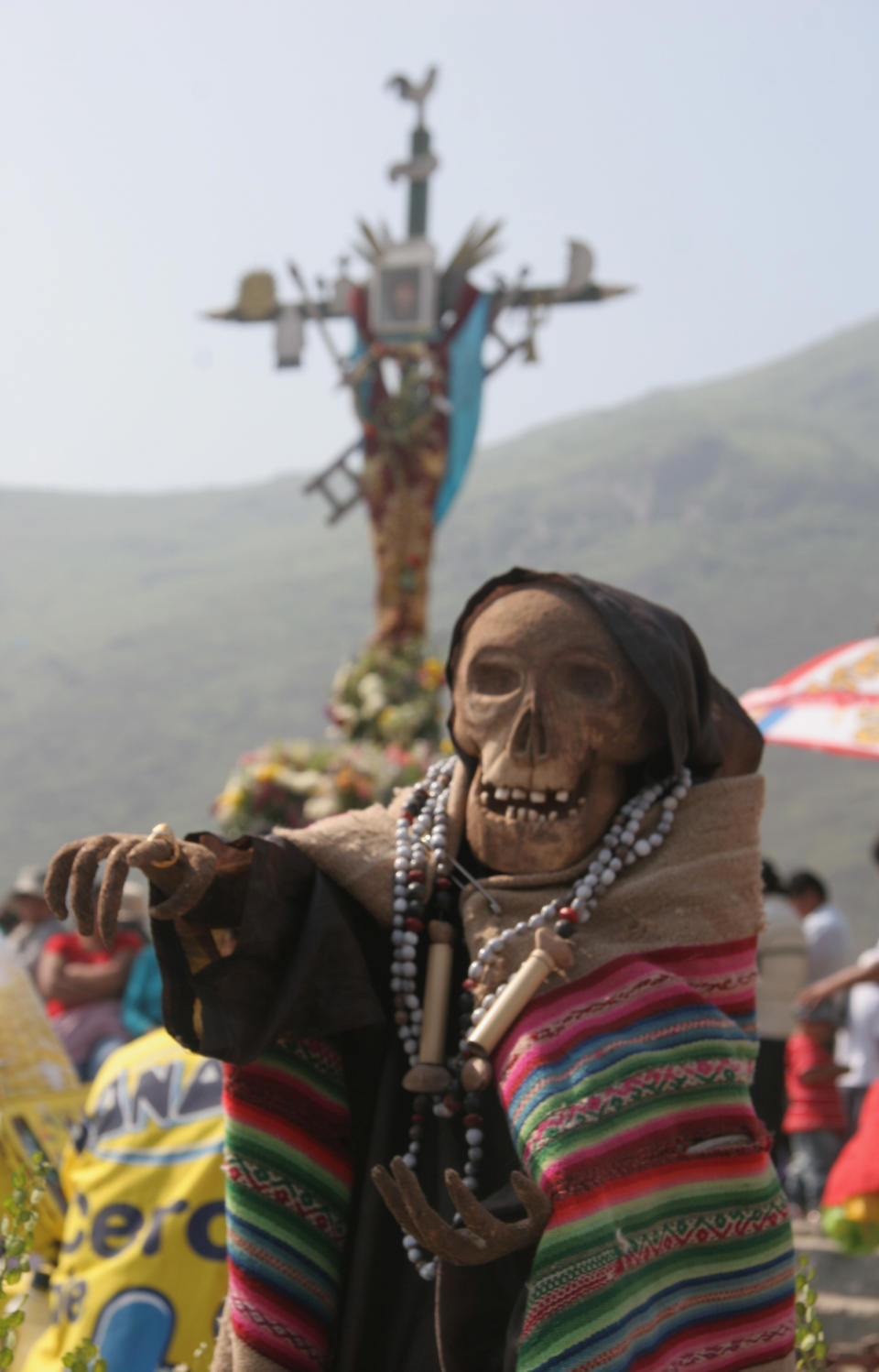 In this Nov. 1, 2012 photo, the sculpture of Santa Muerte is shown during the Day of the Dead festival at the Cemetery of Nueva Esperanza in Villa Maria del Triunfo in Lima, Peru. (AP Photo/Jody Kurash)