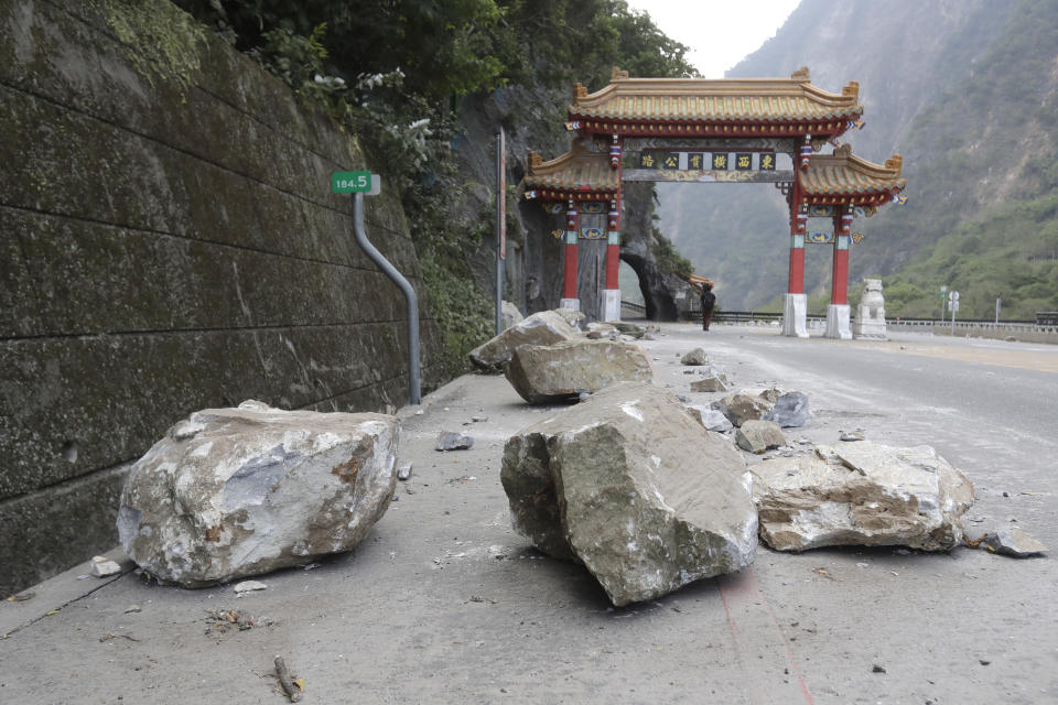 Rocks are on the road at the entrance of Taroko National Park in Hualien County, eastern Taiwan, Thursday, April 4, 2024. The strongest earthquake in a quarter-century has rocked Taiwan during the morning rush hour. (AP Photo/Chiang Ying-ying)