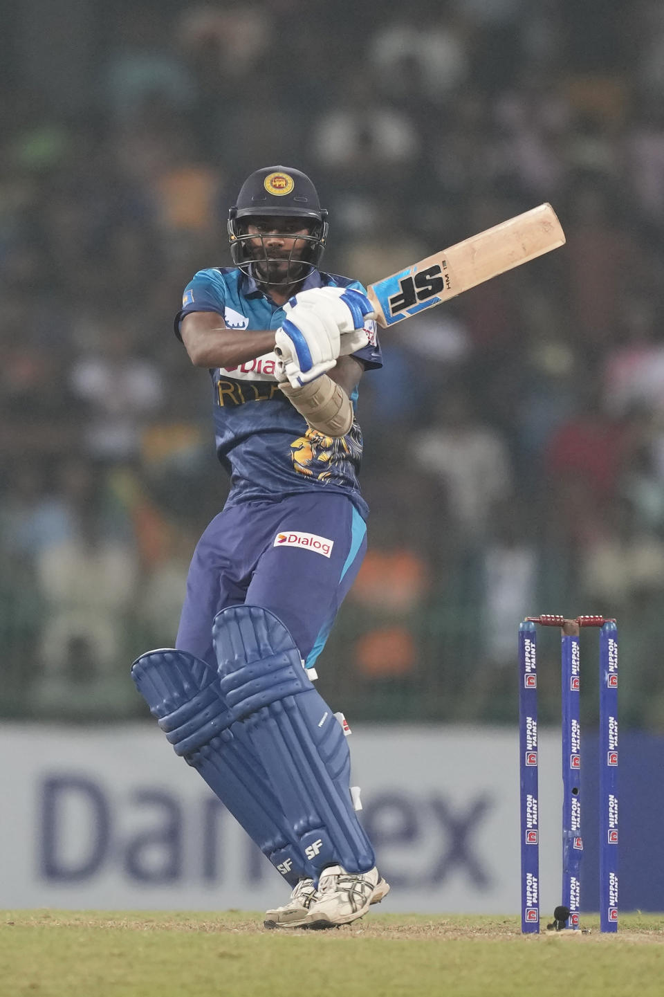 Sri Lanka's Dushmantha Chameera plays a shot during the first Twenty20 cricket match between Sri Lanka and Zimbabwe in Colombo, Sri Lanka, Sunday, Jan. 14, 2024. (AP Photo/Eranga Jayawardena)