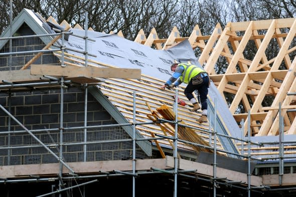 Embargoed to 0001 Tuesday March 25File photo dated 28/2/12 of roof workers building new houses as European migrants are likely to fill thousands of jobs that would be created under Labour's proposed house-building boom if action is not taken to train up young Britons, the shadow housing minister will warn. PRESS ASSOCIATION Photo. Issue date: Tuesday March 25, 2014. The Opposition has drawn up plans to increase the number of new homes to at least 200,000 a year by 2020, which will create up to 230,000 jobs as well as new apprenticeships. But Emma Reynolds will say that research shows the UK faces a looming skills shortage and many of the vacancies are set to to be filled by workers from other European countries. See PA story POLITICS Housing. Photo credit should read: Rui Vieira/PA Wire