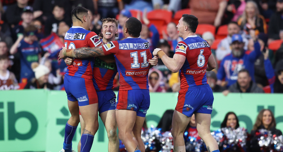 Seen here, Knights players celebrate during their win over the Wests Tigers. 