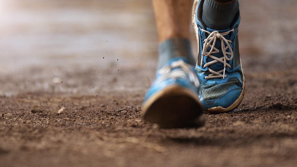 Pair of feet in running shoes