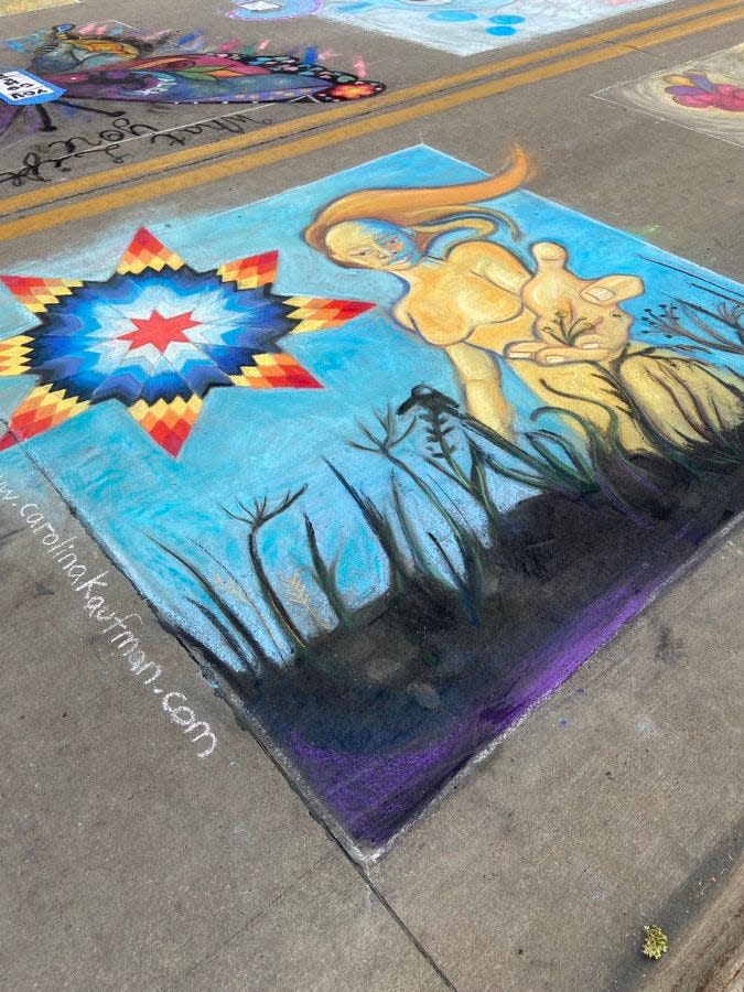 A chalk mural by Carolina Kaufman at Rock the Chalk in downtown Iowa City, Aug. 6, 2021.