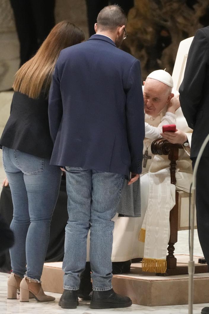 Pope Francis meets with refugee families at the Vatican, Saturday, March 18, 2023. (AP Photo/Gregorio Borgia)