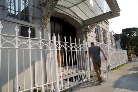 A member of the Consulate General of Russia enters the consulate in San Francisco, California, U.S., September 2, 2017. REUTERS/Stephen Lam