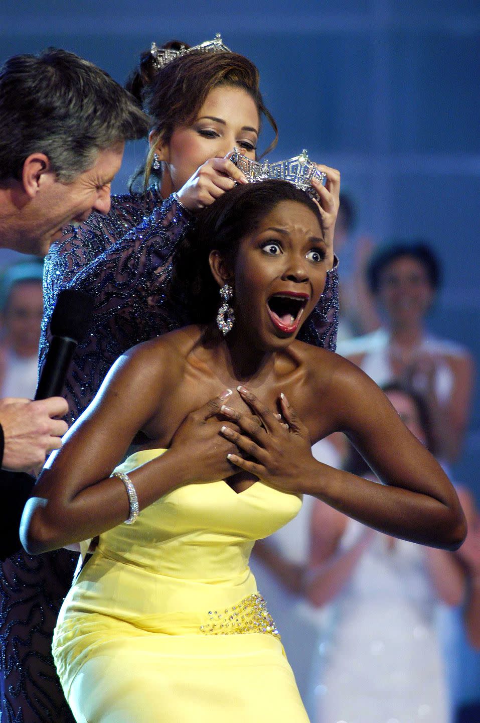 <p>Ericka Dunlap brought a bit of her native Sunshine State with her to the pageant in the form of a canary yellow strapless evening gown. </p>