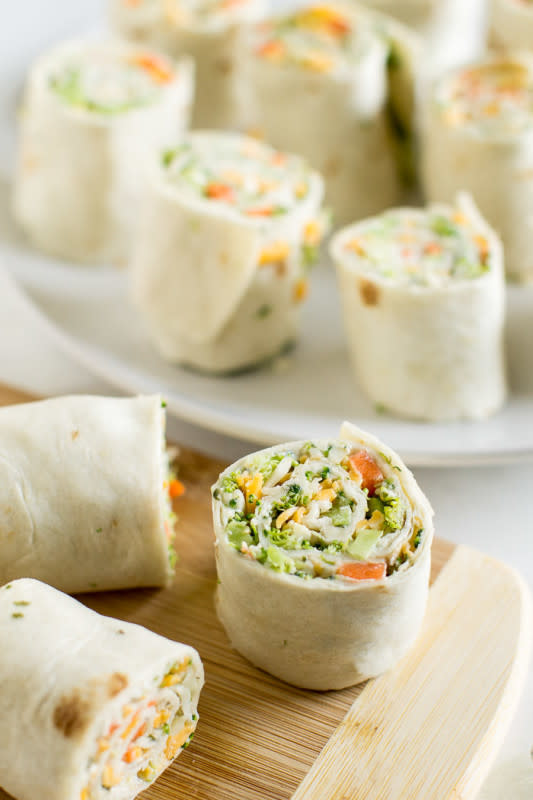 <p>Culinary Hill</p><p>Tortillas filled with cream cheese, topped with veggies and cheese. Slice and serve. Just like veggie pizza!</p><p><strong>Get the recipe: <a href="https://www.culinaryhill.com/vegetable-tortilla-roll-ups/" rel="nofollow noopener" target="_blank" data-ylk="slk:Vegetable Tortilla Roll Ups;elm:context_link;itc:0;sec:content-canvas" class="link ">Vegetable Tortilla Roll Ups</a></strong></p>