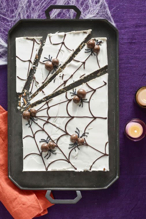 <p>For added spook factor, build spiders out of malt balls.</p><p>Get the <strong><a href="https://www.womansday.com/food-recipes/food-drinks/recipes/a60166/candy-cobwebs-recipe/" rel="nofollow noopener" target="_blank" data-ylk="slk:Halloween Spider Bark recipe;elm:context_link;itc:0;sec:content-canvas" class="link ">Halloween Spider Bark recipe</a></strong>.</p>