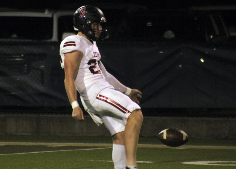 Bishop Kenny's Ethan Eddins (26) punts during an October game against University Christian. The senior specialist, who signed with Southern Illinois football, is among eight Crusaders signing with colleges last week.