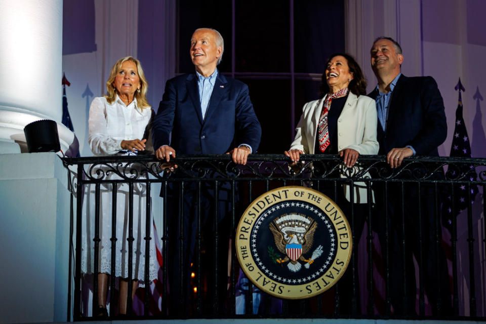 WASHINGTON, DC - JULY 04: President Joe Biden, First Lady Jill Biden, Vice President Kamala Harris, and Second Gentleman Doug Emhoff view the fireworks over the National Mall from the White House balcony during a 4th of July event on the South Lawn of the White House on July 4, 2024 in Washington, DC. The President is hosting the Independence Day event for members of the military and their families. (Photo by Samuel Corum/Getty Images)