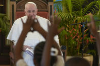 Pope Francis meets with representatives of charities, at the Apostolic Nunciature in Kinshasa, Democratic Republic of Congo, Wednesday, Feb. 1, 2023. Francis is in Congo and South Sudan for a six-day trip, hoping to bring comfort and encouragement to two countries that have been riven by poverty, conflicts and what he calls a "colonialist mentality" that has exploited Africa for centuries. (AP Photo/Gregorio Borgia)