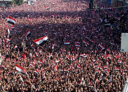 Supporters of prominent Iraqi Shi'ite cleric Moqtada al-Sadr shout slogans during a protest against corruption at Tahrir Square in Baghdad, February 26, 2016. REUTERS/AlaaAl-Marjani