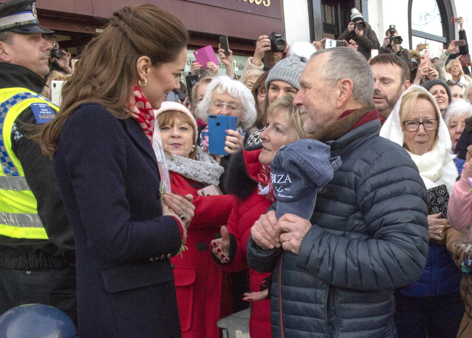 Kate Middleton greets teachers Denise Evans-Alford and Kevin Alford in South Wales