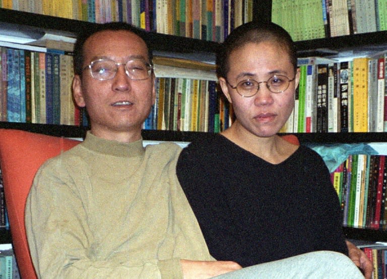Liu Xiaobo and his wife Liu Xia shown in October 22, 2002. Liu Xia was put under house arrest after her husband won the Nobel Peace Prize and their supporters often say she is guilty of nothing but the 'crime' of being Liu Xiaobo's wife