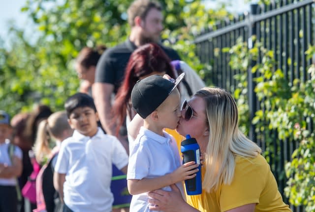 Parents drop off pupils at Queen’s Hill Primary School in Costessey, Norfolk