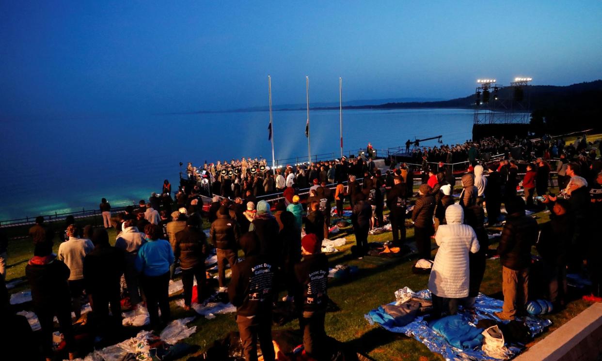 <span>Visitors from Australia and New Zealand attend a dawn ceremony at Anzac Cove in the Gallipoli peninsula. </span><span>Photograph: Kemal Aslan/Reuters</span>