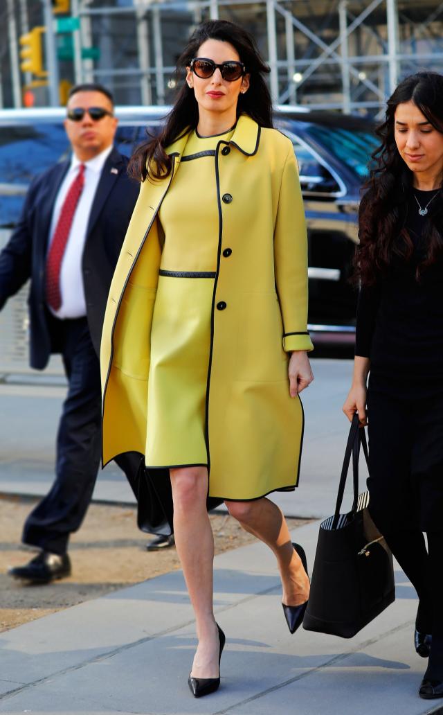 Amal Clooney Wore an Oversized Dior Bag With a Trench Coat