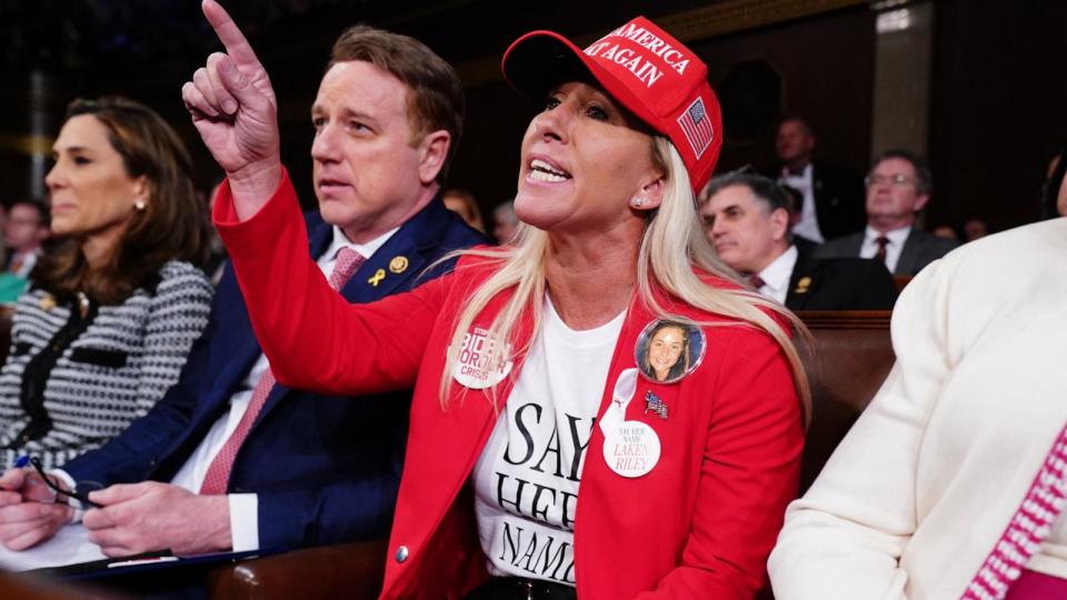 PHOTO: Republican Representative from Georgia Marjorie Taylor shouts as President Joe Biden delivers his third State of the Union address in the House Chamber of the U.S. Capitol in Washington, Mar. 7, 2024.    (Shawn Thew/POOL/AFP via Getty Images)