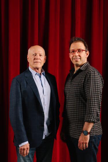 Magician Helder Guimaraes and Academy Award-winning director Frank Marshall pose for a portrait at the Geffen Playhouse.