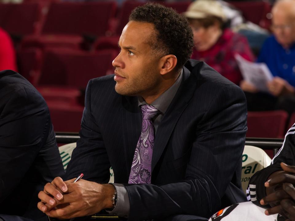 Ira Newble looks on from the bench while coaching during a 2016 G League game.