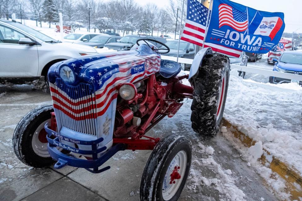 A tractor decorated to show support for Republican presidential candidate former President Donald Trump is displayed outside the the Machine Shed after Donald Trump, Jr. speaks in Urbandale, Iowa, Thursday, Jan. 11, 2024 (AP)