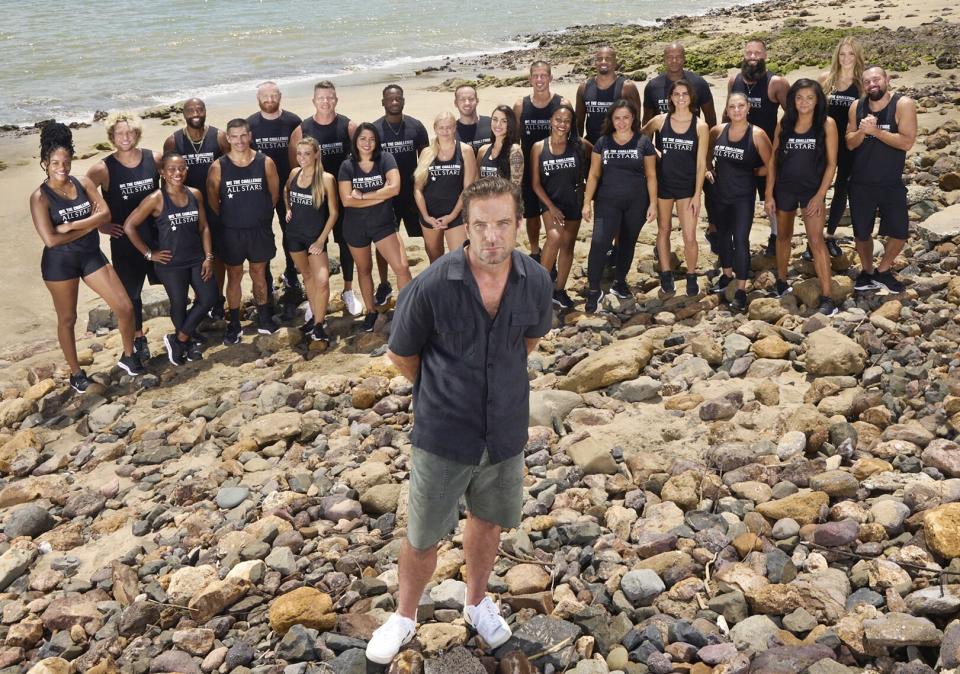 THE CHALLENGE: ALL STARS Season 3 -- T.J. Lavin host of THE CHALLENGE: ALL STARS with the cast: (back row L-R) Nia, MJ, Syrus, LB, Mark, Nehemiah, Tyler, Yes, Darrell, Laterrian, Brad and Melinda (front row, L-R) Roni, Jordan, Kendal, Sylvia, Jennye, Kailah, Cynthia, Tina, Kellyanne, Veronica, Jonna, and Derrick in THE CHALLENGE: ALL STARS season 3 streaming on Paramount+ Photo: Laura Barisonzi/MTV ENTERTAINMENT/Paramount+ ©2021 MTVE and CBS Interactive Inc. All Rights Reserved